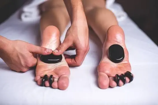 Hot Stone Massage vs Foot Massage & Reflexology Comparison